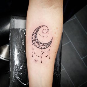 小臂黑灰月亮梵花纹身图案